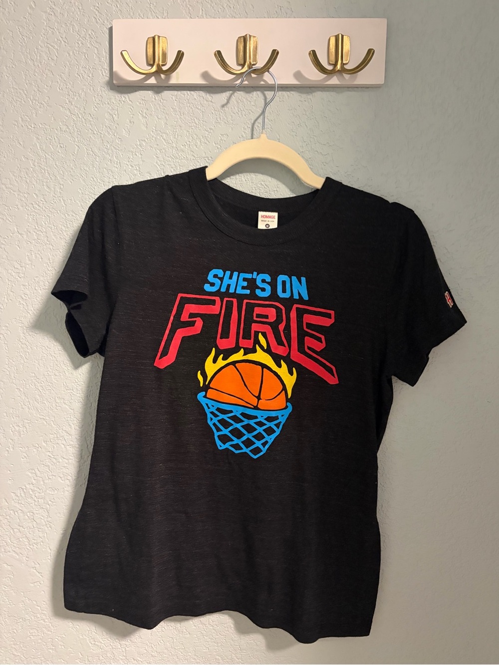 HOMAGE Black Tee with Red, Blue & Yellow Basketball Graphic